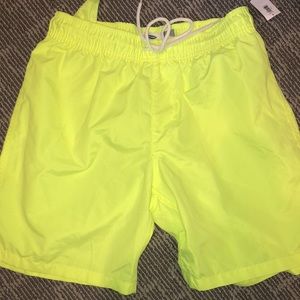 Dive in with these sunny yellow swim trunks